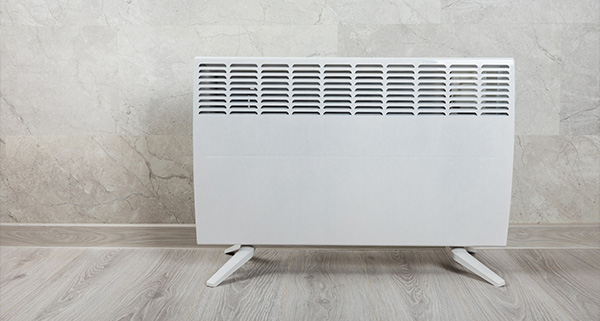 white electric heater on beige floor tiles in modern interior design with subtle textures and patterns for heating two rooms